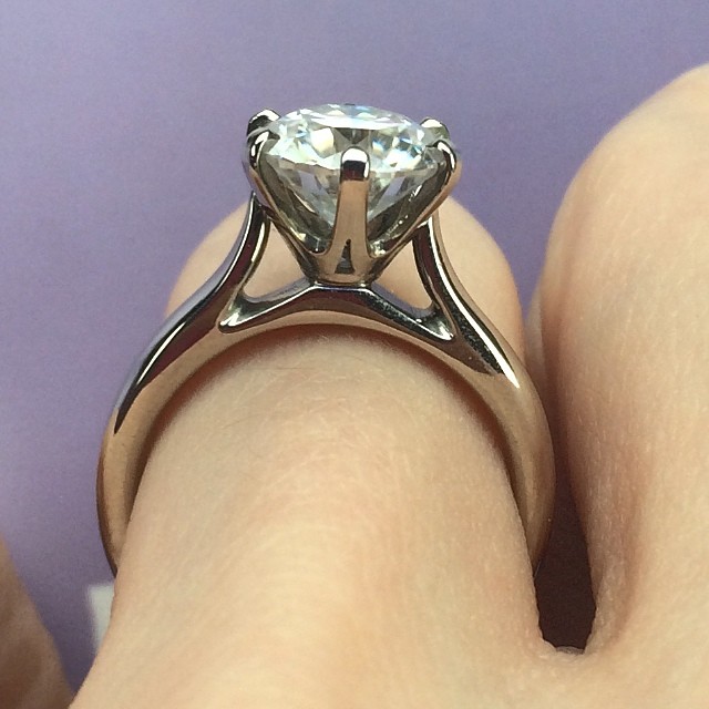 I wanted to share a little more info about my ring and the stone itself! I don't agree with the diamond industry in principal so a long time ago I made the choice to not own another diamond. I learned about #Moissanite around that time, then later learned about another similar, but newer stone- the #AmoraGem. It's a perfected form of silicon carbide, and the first stone to exceed diamonds in nearly every measure. It is the most brilliant gem in the world- 10% more brilliance and 200% more fire than a diamond. It is found in nature in stardust and in small quantities in earth's core. It's is currently one of the rarest stones on the planet. It is optically superior and structurally different than moissanite, and will never cast green or yellow like moissanite does. Currently the Amora Gem is illegal to ship to the USA and many other countries, but @fueledbypez managed to smuggle it in through an Indian reservation as the patent laws that restrict it's sale and shipment don't apply there. So I have a rare, smuggled stone with unparalleled fire, brilliance and hardness that was originally discovered on a meteor covered in star dust that fell to earth in the 70's (in Arizona no less!) So cool! I hope any of you reading consider a diamond alternative for the sake of the earth, human suffering and your own budget. The #amoragem is by no means cheap, but is a fraction of the cost of diamond. My stone is a 2.04 carat Internally Flawless E (colorless) stone set in a Tiffany style cathedral solitaire. Max got it through www.betterthandiamond.com and says he had a great experience start to finish :)