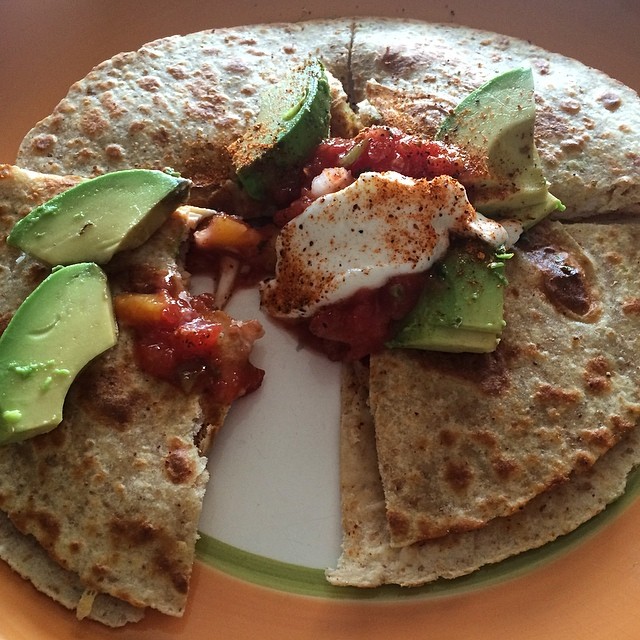 I love not being afraid of carbs anymore  That means I can have a quesadilla instead of just a tiny burrito I still use low carb tortillas, because they are easier on the overall #macros. This delightful lunch was 2 La Tortilla Factory low carb whole wheat tortillas, 3oz chicken breast, 1/4 reduced fat cheese, seasoned with #MrsDash fiesta lime blend, topped with peach mango salsa, avocado and 0% Greek yogurt. 374 cals, 19F, 29C, 38P#iifym #flexibledieting #fitfam #fitspo #fitfoods #cleaneating #compprep #bikiniprep #healthylunch #eatforabs #macrodieting