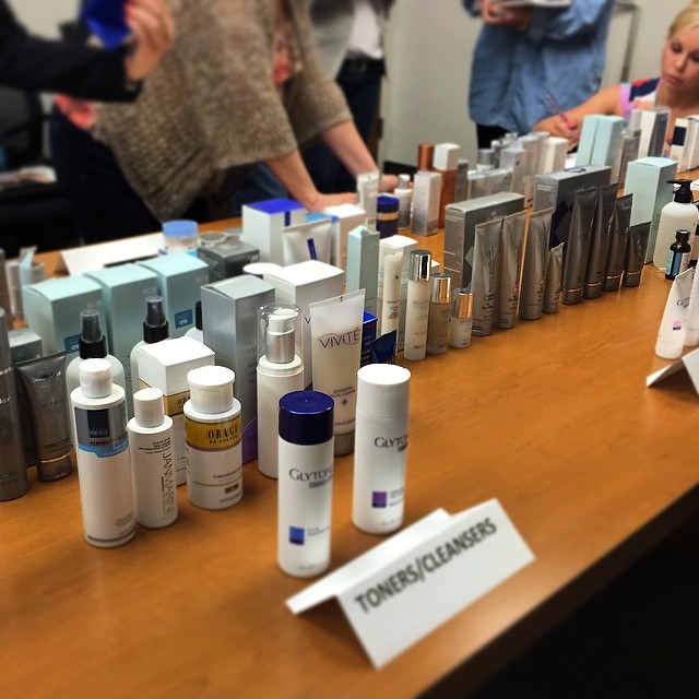 #Skincare competitive analysis! Teaching my trainees about all of the different brands in the professional skincare market. Let me tell you, this table is a product junkies dream! Only about 1/4 pictured here!!