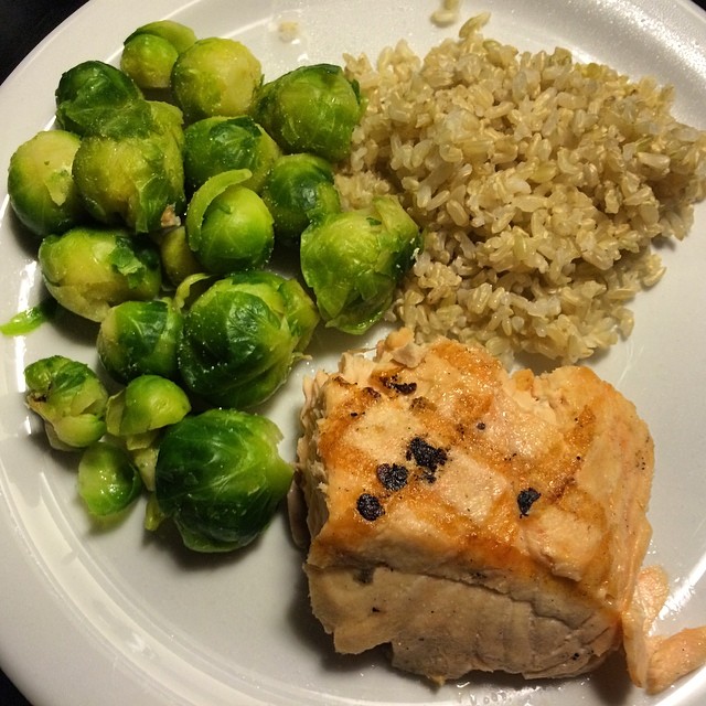Hitting those #macros like a boss! I was pleasantly surprised by the frozen brown rice and Brussels sprouts. Not bad at all! And of course the grilled #salmon was dope (better be at $25/lb ). Threw this together in minutes with only the microwave  Saved room for a some dark chocolate to curb my evening sweet tooth  #fittravel #bromeals #contestprep #iifym #wholefoods #hotellife #healthytravel