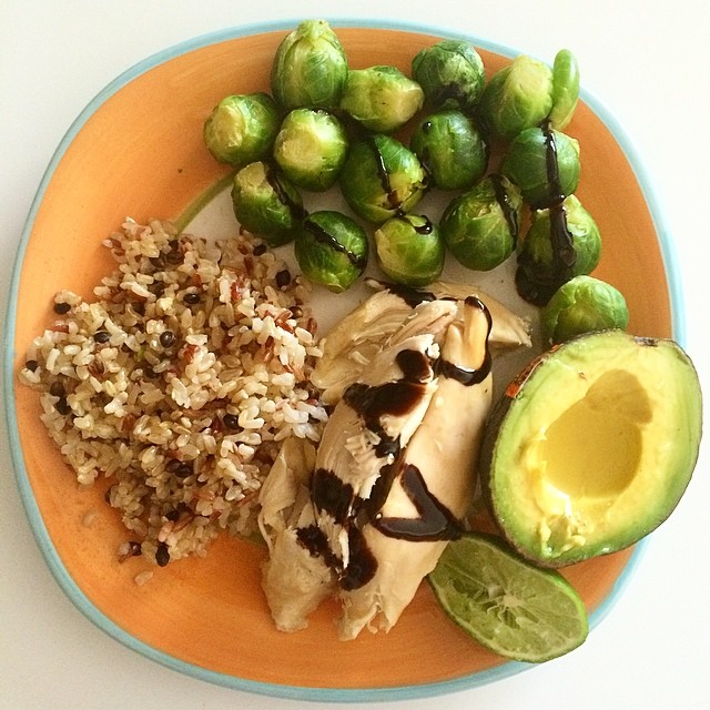 Trying to stick to a #budget so I'm going to commit to making meals out of my freezer this week! Baked #chicken breast, frozen #Brussels, frozen wild rice medley and half a glorious #avocado with lime. And a drizzle of #balsamic, obvi. #macros- 498 cals, 18F, 45C, 37P, 12 Fiber #macrodieting #iifym #flexibledieting #eatforabs #fitfoods #healthylunch #fitfam #fitspo #foodisfuel