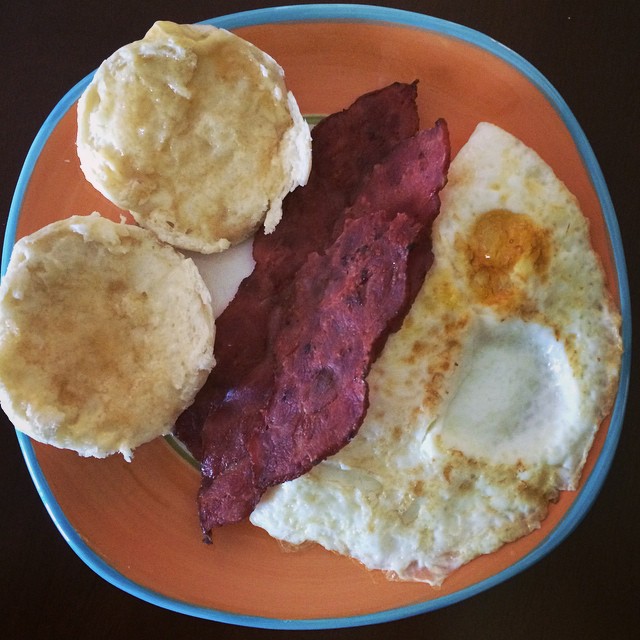 Good hearty #brunch to turn into all the #gainz later today! Went nuts at #wholefoods... #organic non GMO buttermilk biscuits topped with organic honey from #PuertoRico, organic cage free range turkey bacon, organic free range eggs. What a treat! Ate up about half my fats for the day, but totally worth it! #macros for this feast- 556 cals, 36C, 35P, 28F, 1g Fiber (lol) Have I mentioned lately that I love food?!